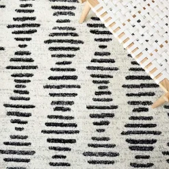 Discount Kirklands Home Black and Ivory Tulum Geometric Area Rug, 5x7
