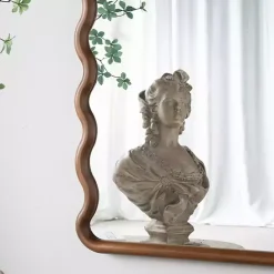 Kirklands Home Dark Gold Arched Wavy Wall Mirror