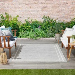 New Kirklands Home Bordered Indoor/Outdoor Area Rug, 5x7 Gray