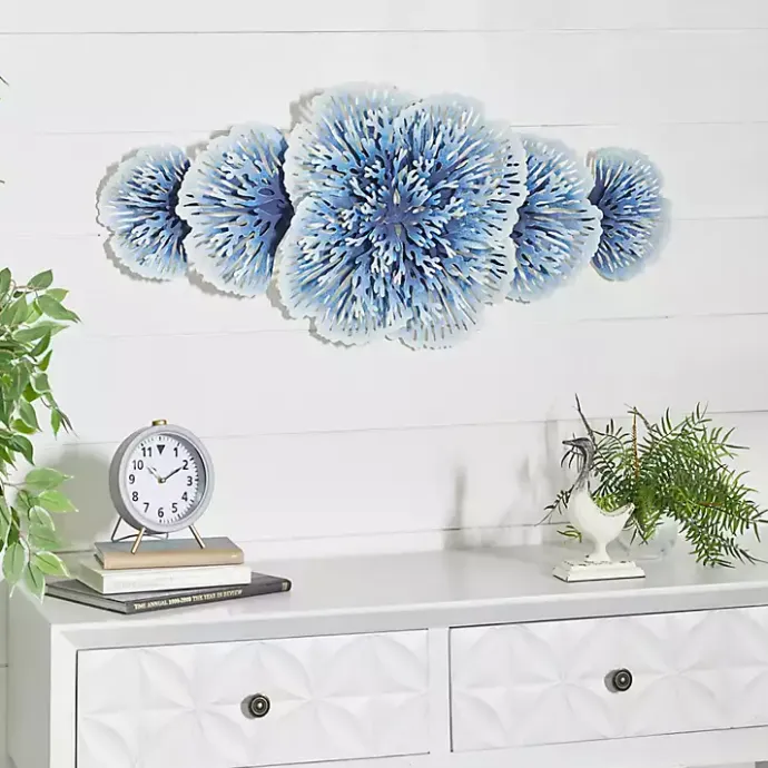 Discount Kirklands Home Matte and White Flowers Metal Wall Plaque Blue