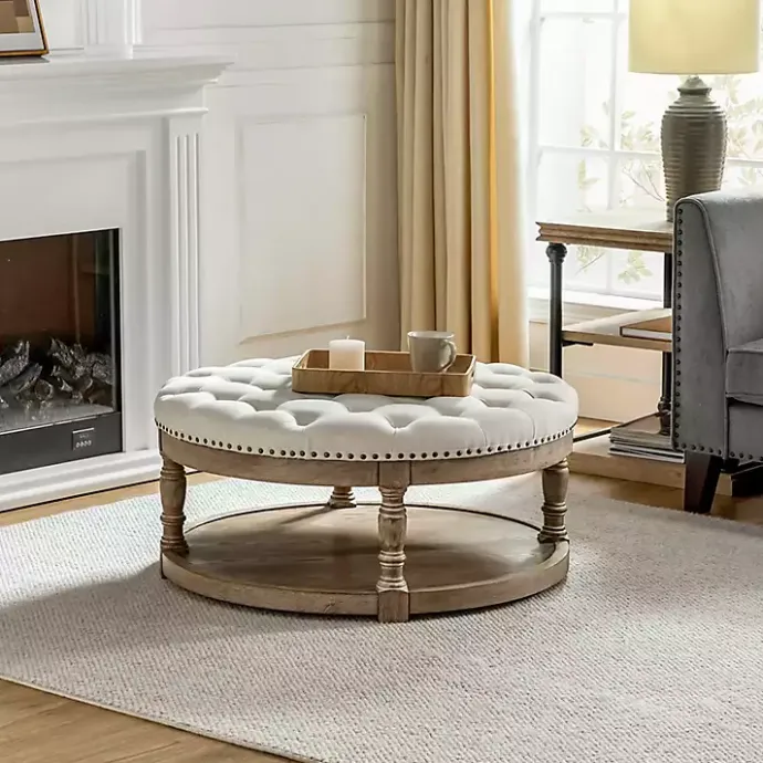 Discount Kirklands Home Round Cepheus Tufted Ottoman Ivory